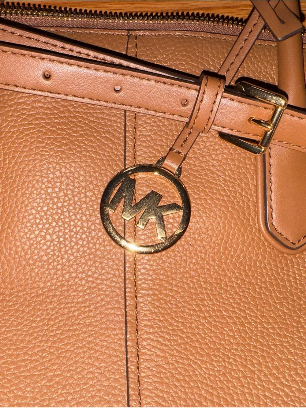 Gorgeous Michael Kors Cognac pebbled Leather Satchel with Gold Charm